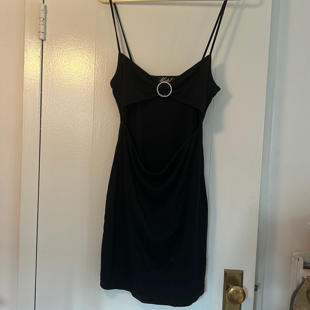 Black mini dress with midriff cut out. Size L. Very cute.